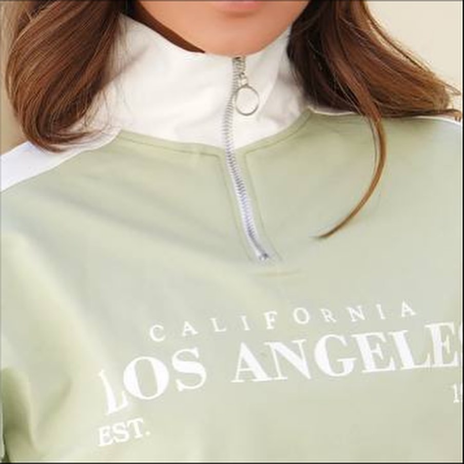 بلوز زنانه  دورس نیم زیپ طرح LOS ANGELES